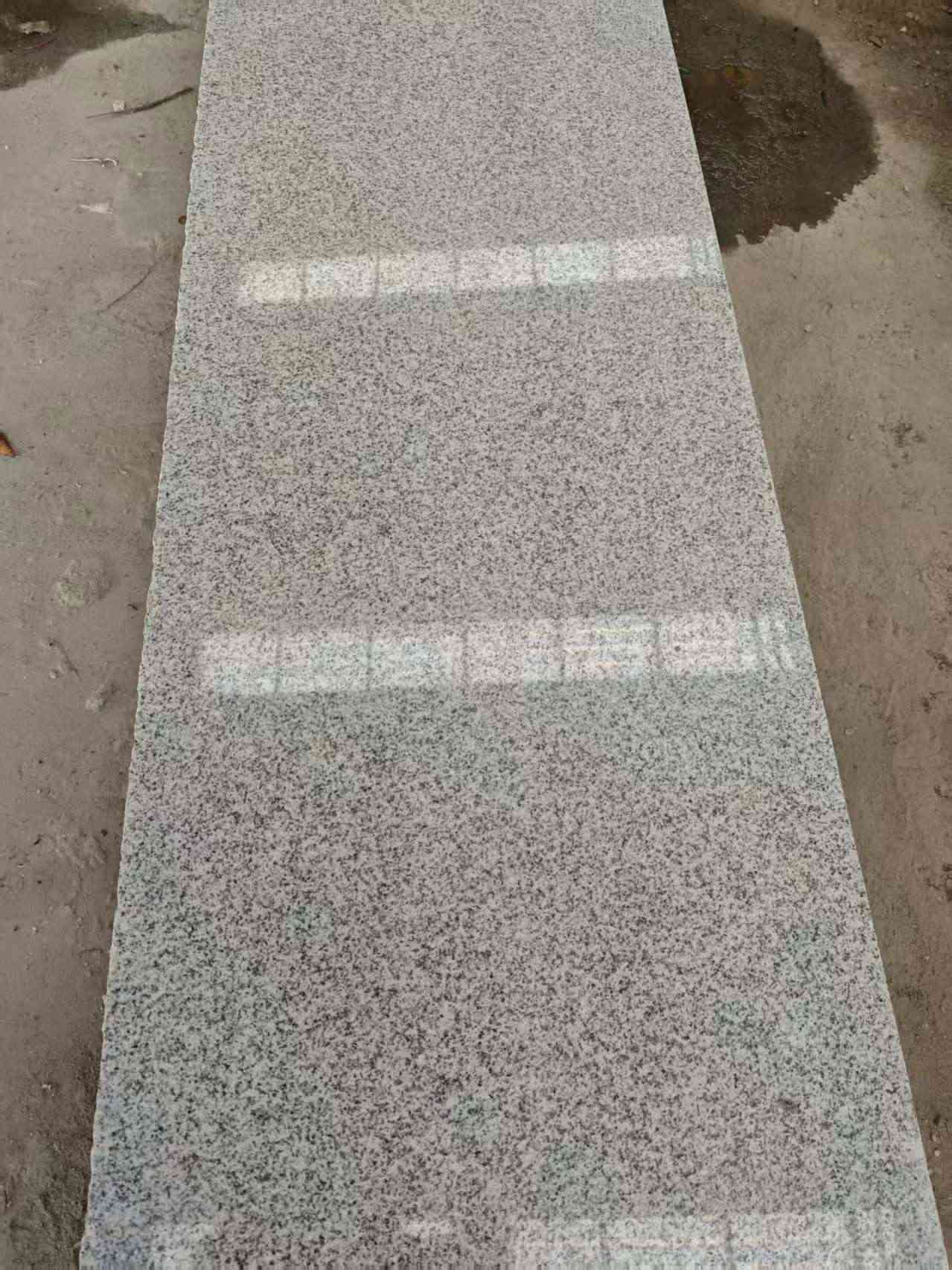 韶关芝麻白光面毛板